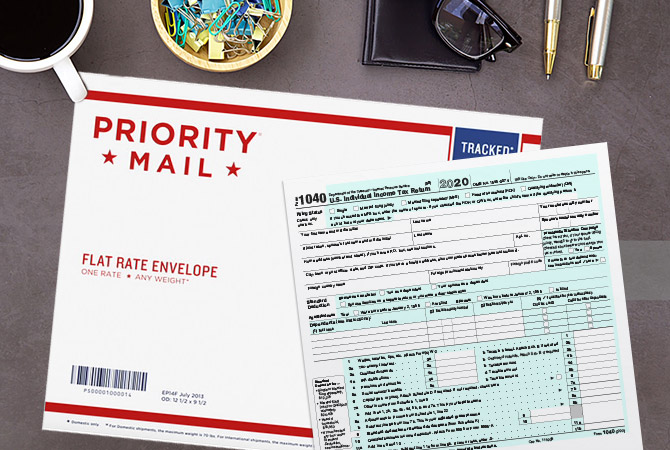 Priority Mail envelope and 1040 tax form.