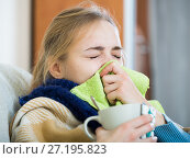 Adult female under blanket with flu attack indoors. Стоковое фото, фотограф Яков Филимонов / Фотобанк Лори