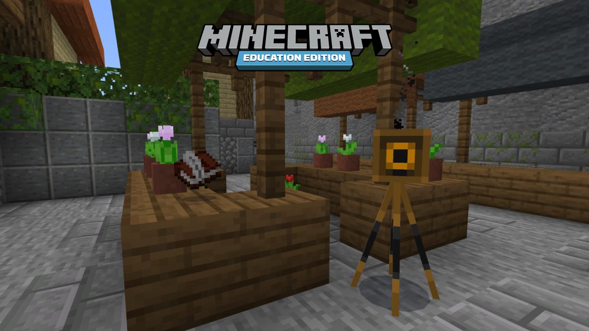 A camera and a book and quill stand next to a shelf in Minecraft: Education Edition.