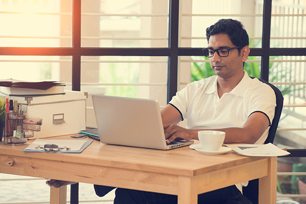 a man working on his laptop