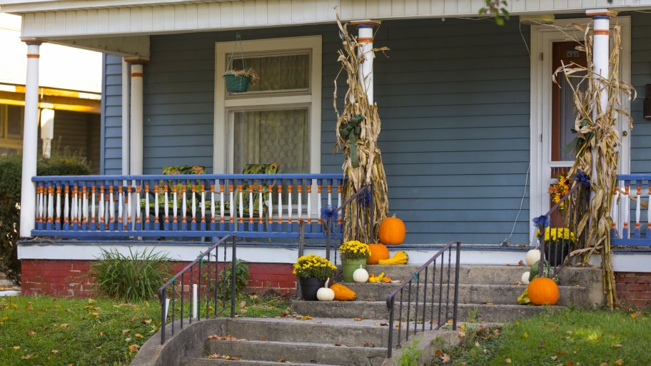 front porch decorated for fall