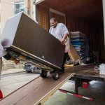 Moving crew loading a truck