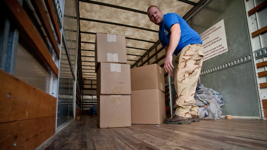 Movers loading a truck