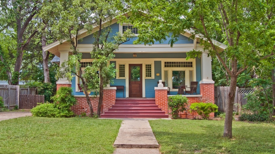 Craftsman bungalow house with trees