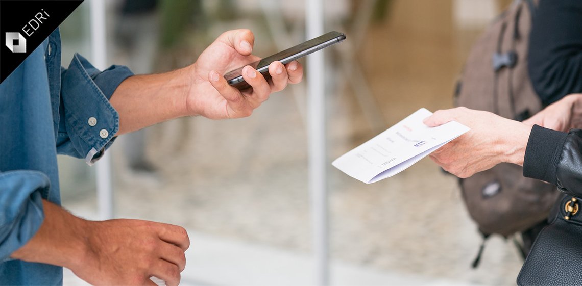 A person scanning a document with their phone.