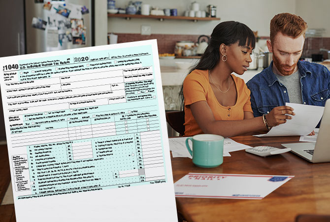 1040 tax form with couple in the background working on taxes.