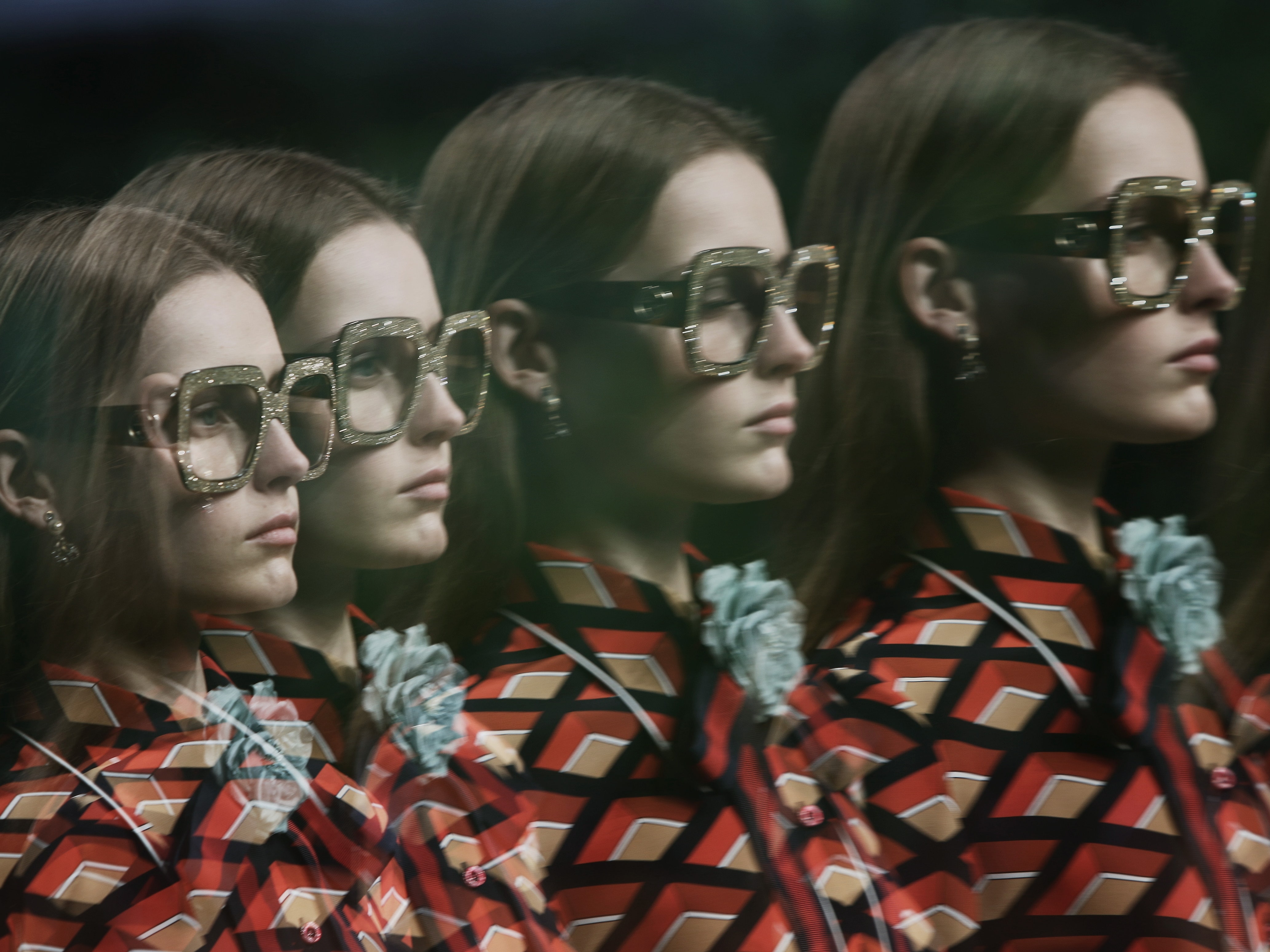 MILAN ITALY  SEPTEMBER 23  A model walks the runway during the Gucci fashion show as part of Milan Fashion Week...