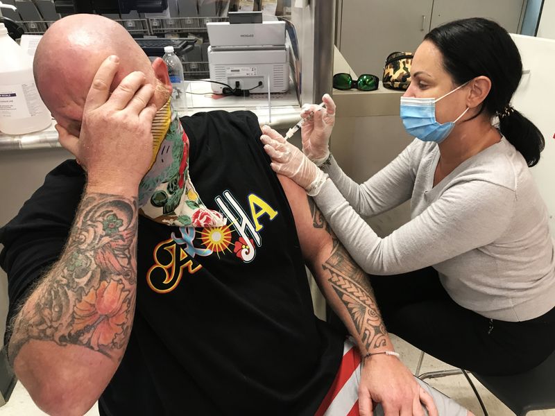 Shane Curran, fear of needles, gets his vaccine against COVID-19 - during the Coronavirus pandemic.