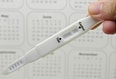 pregnancy test and calendar