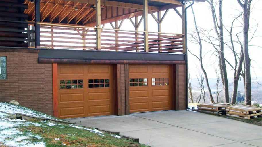 garage and driveway with mountain view