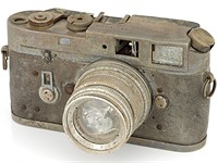 Fire-damaged and unusable Leica M4 and Summicron lens sells for around $2,000