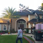 roofing contractors working on home