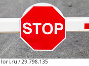 Red stop road sign. Стоковое фото, фотограф EugeneSergeev / Фотобанк Лори