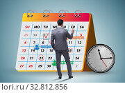 Business calendar concept with businessman. Стоковое фото, фотограф Elnur / Фотобанк Лори