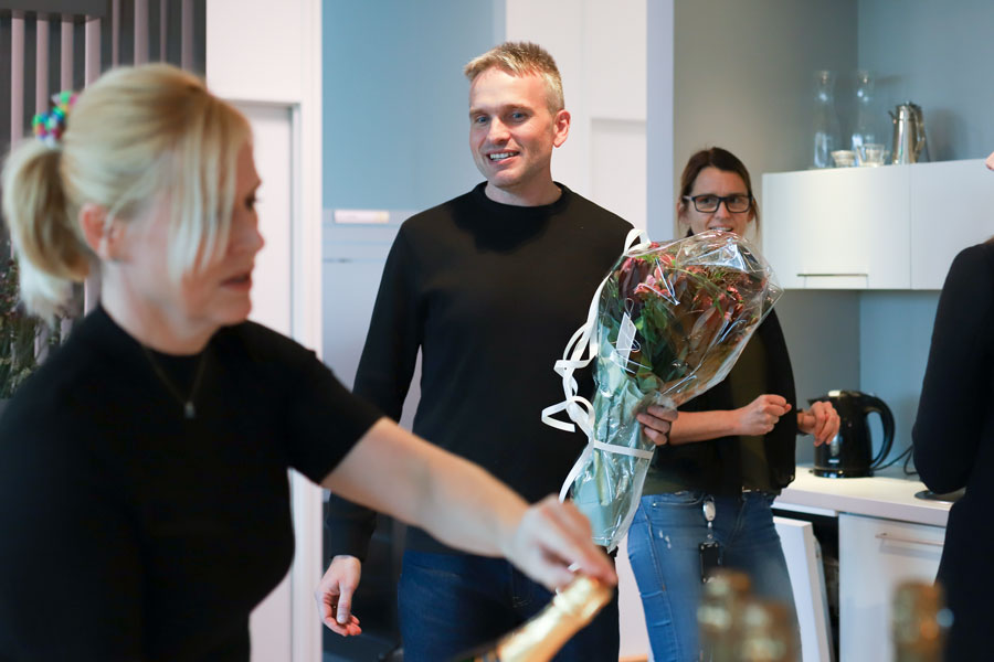 CEO holding flowers