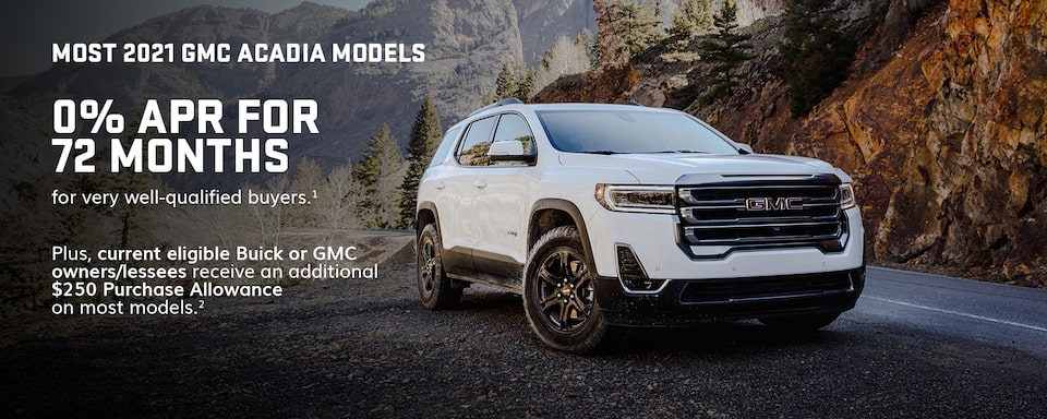 2021 GMC Acadia Denali Mid-Size Luxury SUV front angle exterior view driving on road