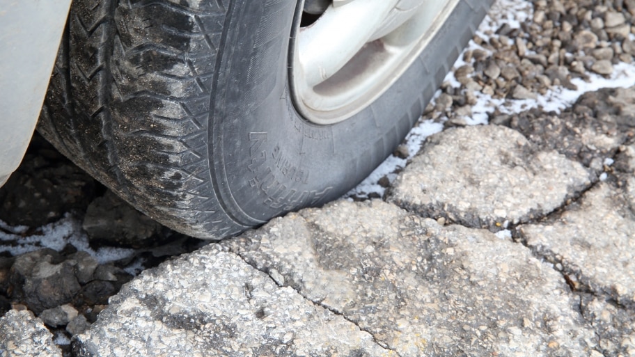 tire in pothole