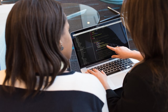 Women looking at computer screen