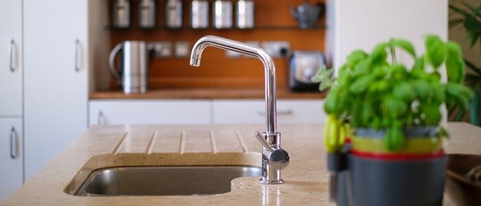 arc faucet on kitchen sink