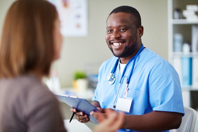 Doctor with tablet