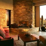 fireplace in living room opening up to a desert scene