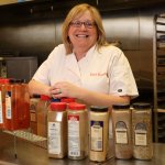 Chef Suzanne posing with spices