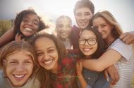 Teenage school friends smiling and having fun