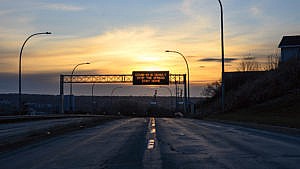 A message board over a highway in Halifax on Tuesday, April 21, 2020. (Darren Calabrese)