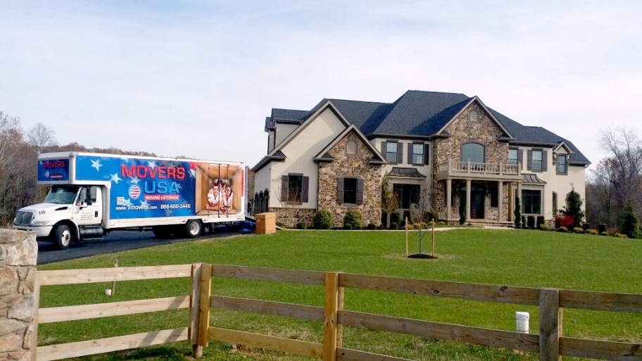 moving truck by house