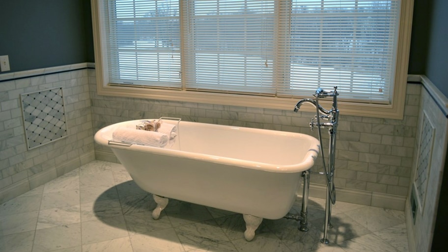 refinished bathtub in remodeled bathroom