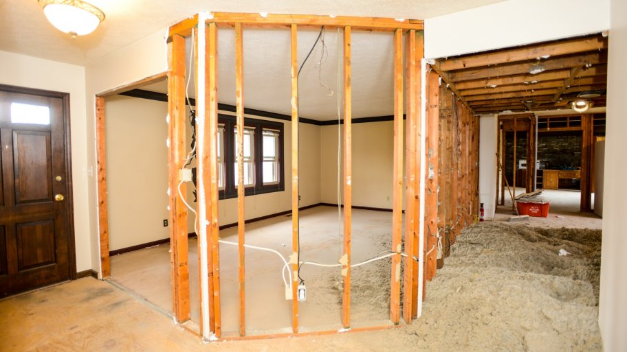 home remodel in process with drywall, studs and wiring exposed