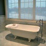 refinished bathtub in remodeled bathroom