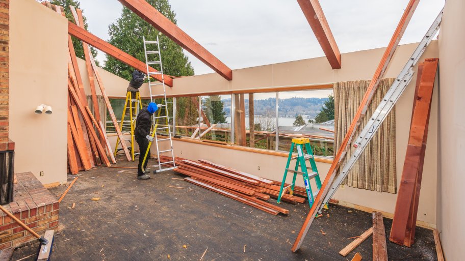 contractors disassembling a home