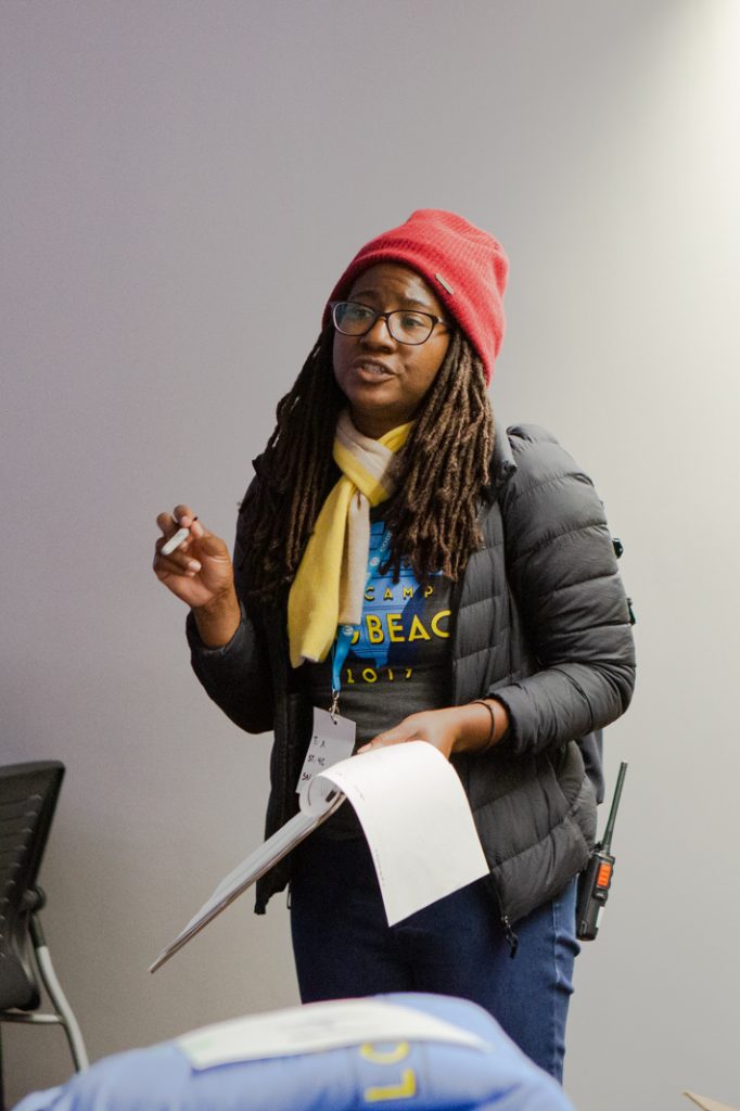 Renee Johnson giving instructions to Volunteers