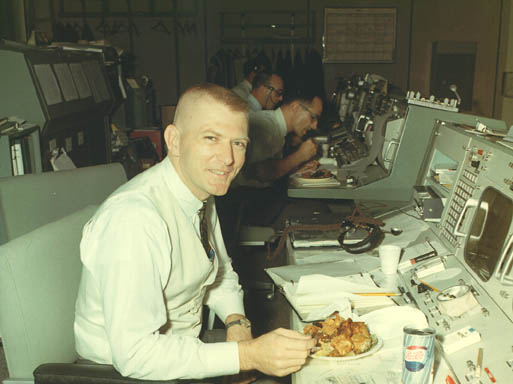 Gene Kranz working at his flight director's console in the Mission Operations Control Room at Houston circa 1965. (NASA Photo S-65-60057.)