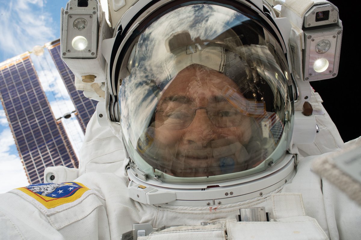 Closeup of NASA astronaut Mark Vande Hei in spacesuit on spacewalk