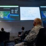 Warfighters at Nellis Air Force Base, Nev., are briefed on the capabilities of the Advanced Battle Management System at the Shadow Operations Center-Nellis, Feb. 26, 2021. The ShOC-N has been tasked by the Joint Chiefs of Staff to become the Air Force’s Joint All-Domain battle laboratory for information gathering and dissemination and application testing and development in order to further enable the Air Force’s ABMS mission