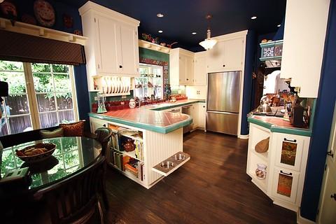 Newly remodeled kitchen with contrasting dark and light colors