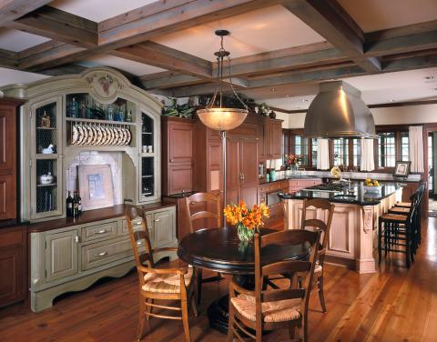 Cozy kitchen with natural wood colors and open dining table