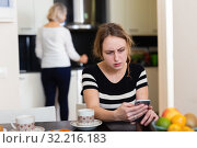 Pensive woman using smartphone. Стоковое фото, фотограф Яков Филимонов / Фотобанк Лори