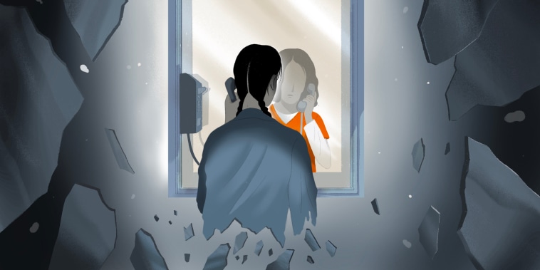 Illustration of an incarcerated woman speaking to another woman during a visit at a prison. The visitor is breaking into shards.