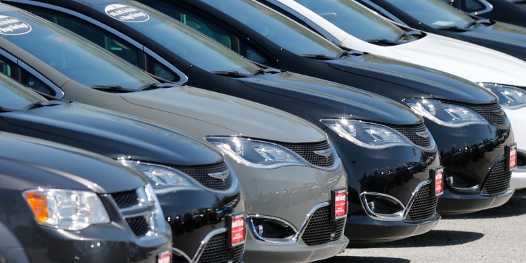 Image: Cars for sale at an auto dealer lot, in St. Louis County, Mo., on April 15, 2020