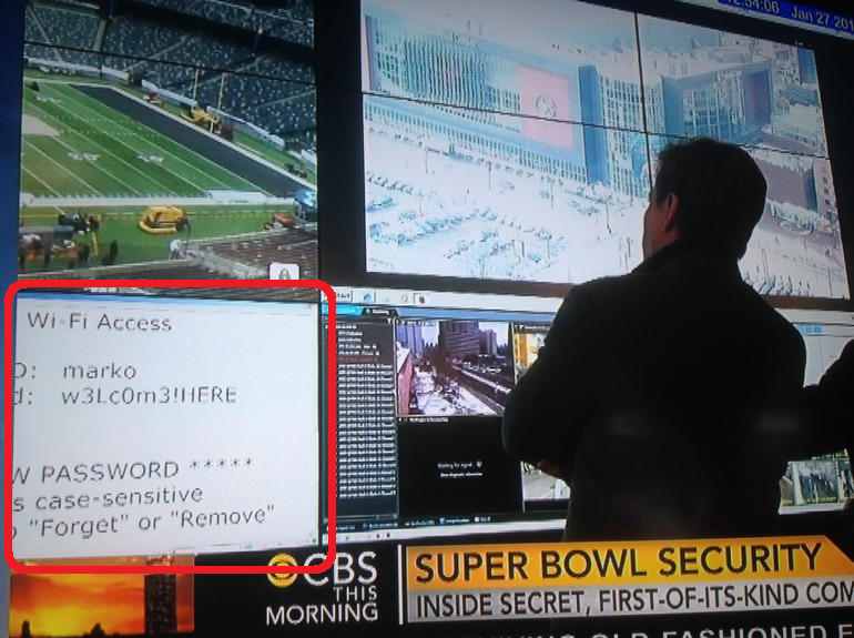 Wi-Fi login credentials displayed on a screen in the stadium command center.