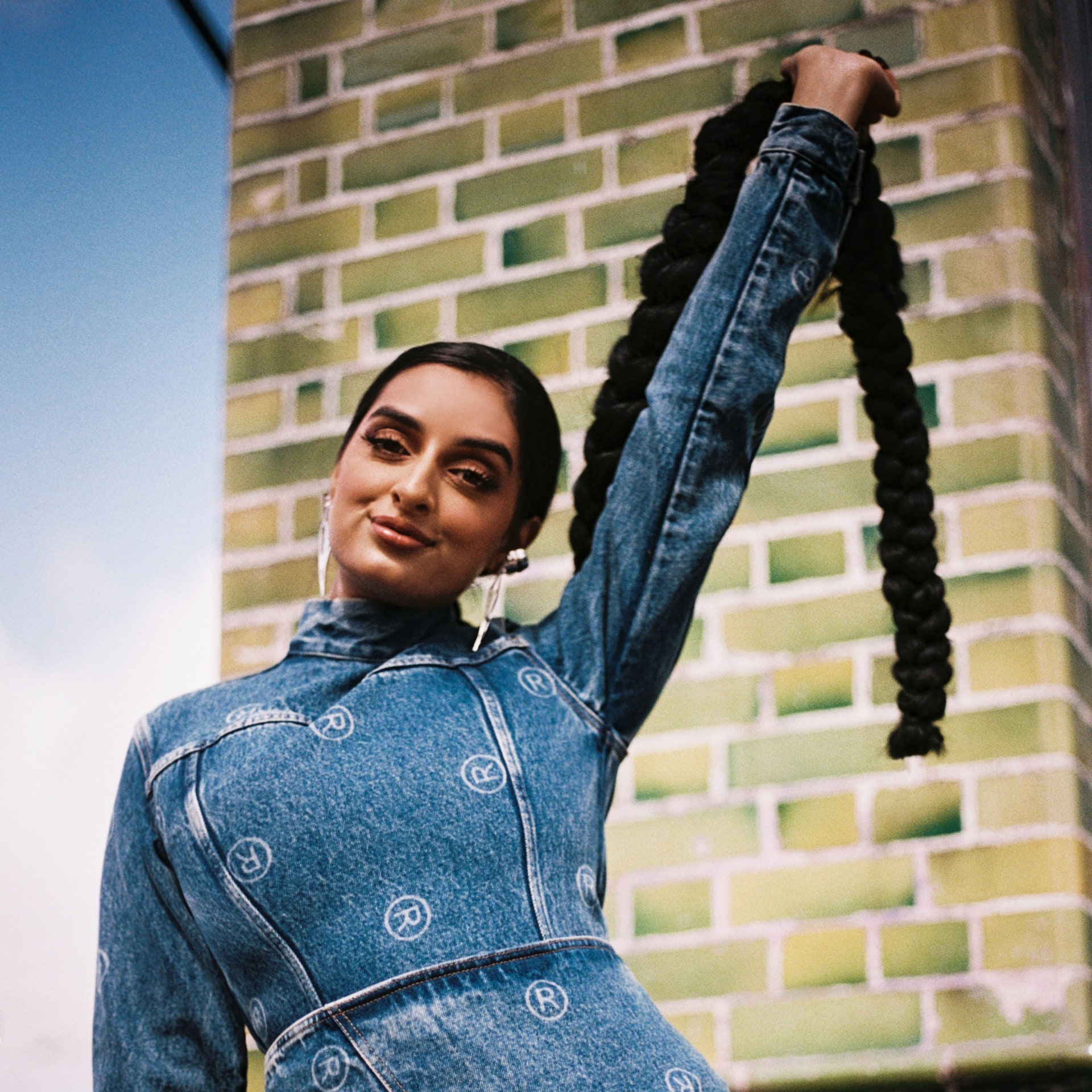 Anita wears skirt and top by Martine Rose and jewellery by Sweet Lime Juice.