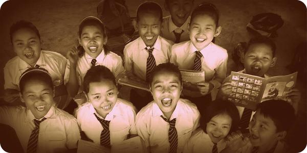 Tibetan children with books