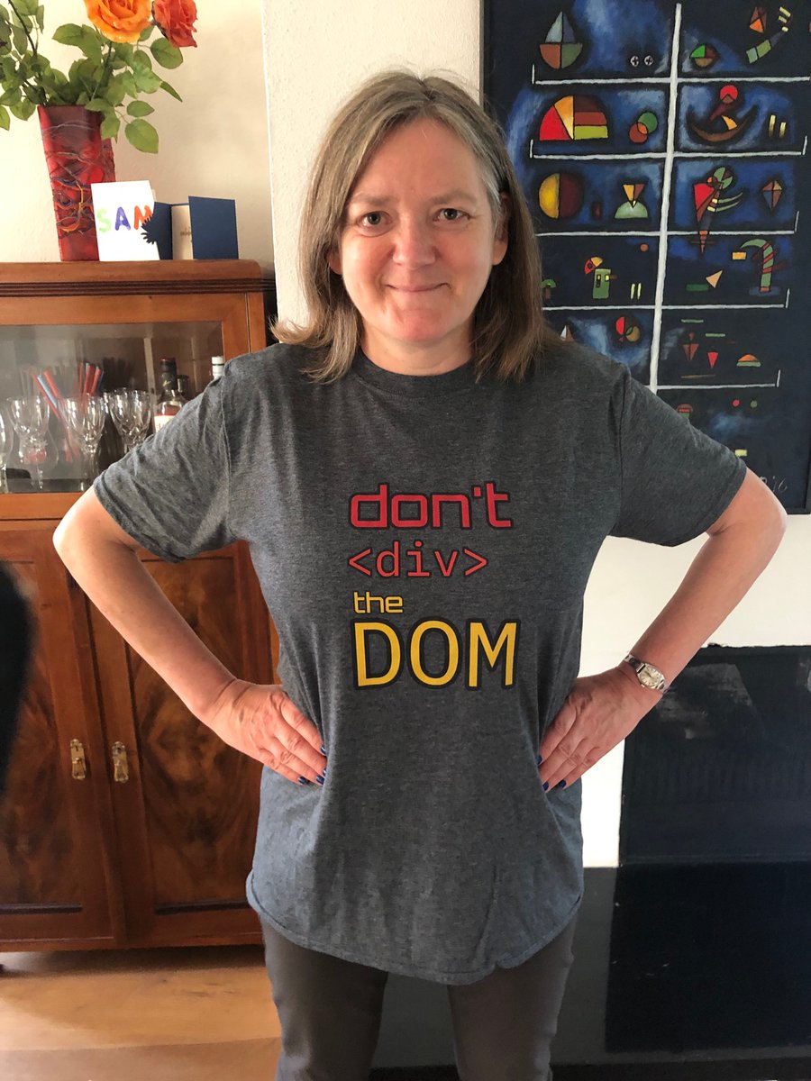 My in my t-shirt, it's gray with the text don't div the DOM, as a reference to please write semantic HTML.