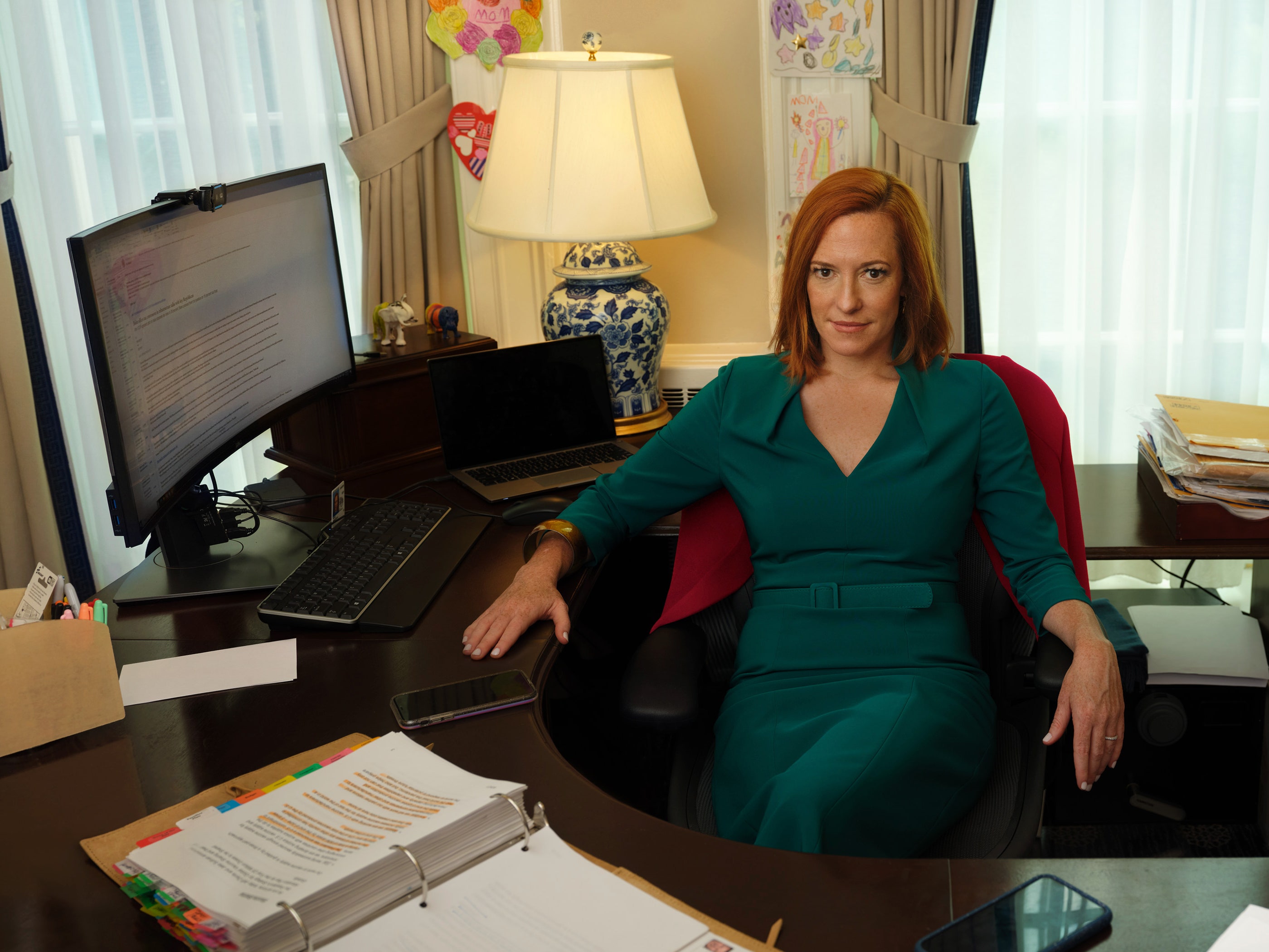 Image may contain Jen Psaki Furniture Human Person Table Computer Keyboard Electronics Computer and Keyboard