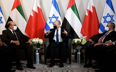 Prime Minister Naftali Bennett (C) meets with UAE Minister of State for Foreign Affairs Khalifa al-Marar, (R) and Bahraini Foreign Minister Abdullatif Al Zayani (L) at his hotel in New York on Sunday evening (Avi Ohayon/GPO)