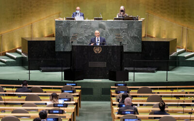 Prime Minister Naftali Bennett addresses the 76th Session of the United Nations General Assembly, Monday, Sept. 27, 2021, at U.N. headquarters. (AP Photo/John Minchillo, Pool)