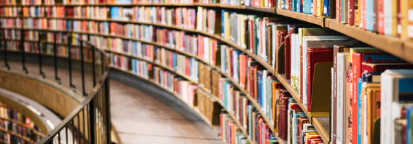 Books on a shelf at a library